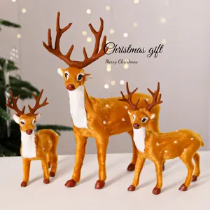 Set of three realistic faux fur Christmas reindeer figurines for holiday decoration.
