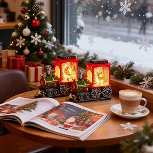 Festive LED Christmas train night lights with Santa and reindeer scenes on table