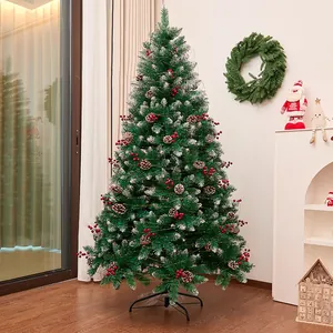 Elegant snow-flocked Christmas tree with pine cones and red berries for home decor
