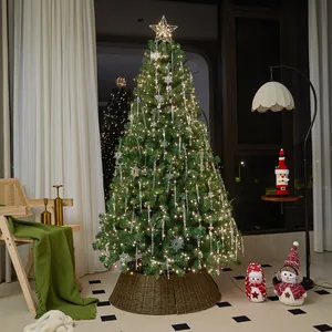 Elegant pre-lit Christmas tree with snowflakes and wicker collar for cozy home holiday decor