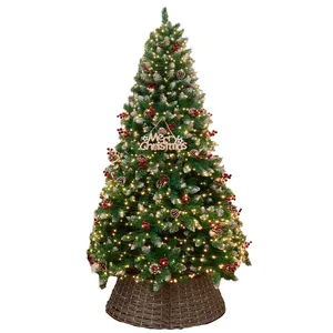Premium pre-lit artificial Christmas tree with pinecones, red berries, and woven wicker base.