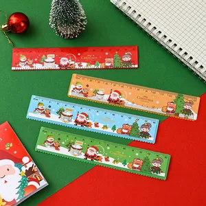 Set of four colorful Christmas-themed 15cm rulers with festive cartoon designs