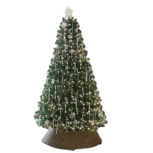 Premium pre-lit Christmas tree with warm lights snowflake ornaments and woven base cover