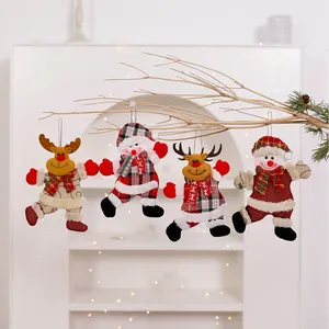Set of festive plush Christmas ornaments featuring adorable reindeer and snowman figures.