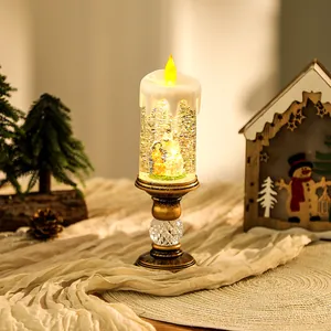 Detail showing festive Christmas water-filled candle lamp with nativity snow scene.