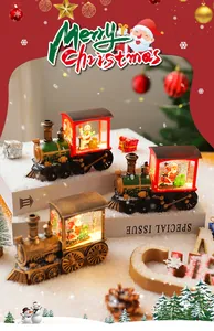 Decorative festive Christmas water-filled Santa Claus train night light with warm LED glow
