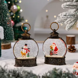 Macro detail of decorative Christmas lanterns featuring Santa Claus and snowman themes.