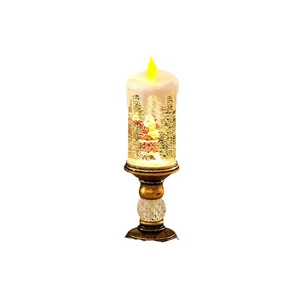 Festive water-filled Christmas candle LED lamp with Santa Claus figure and glitter.