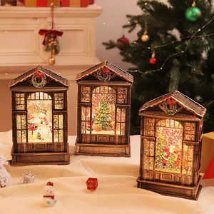 Macro view of three vintage bronze Christmas lanterns with warm LED lighting and glitter