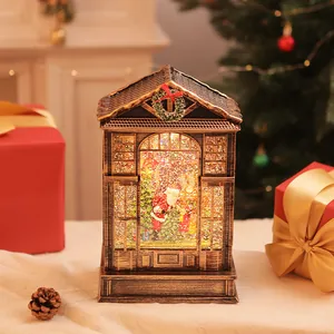 Vintage Christmas lantern snow globe with LED lights and rotating Santa Claus scene