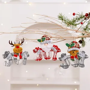 Festive 'JOY' fabric Christmas ornaments featuring Santa, reindeer, and bear dolls