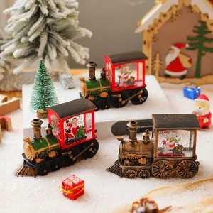 Festive Christmas train snow globe night light with Santa and snowman motifs
