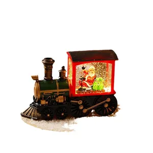 Vintage style Christmas train snow globe with Santa Claus figure and warm LED night light