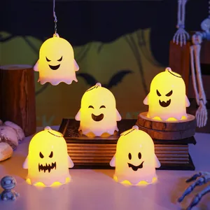 Set of glowing cute ghost night lights with different expressions for Halloween decor