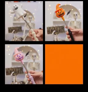 Close-up of LED Halloween glowing wands featuring ghost and pumpkin designs for parties