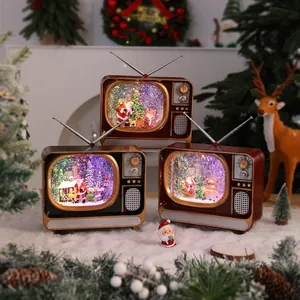 Vintage Christmas TV music box with colorful lights and snow effect for holiday decor.