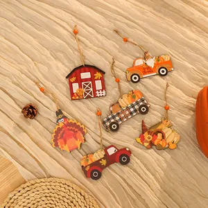 Detailed view of colorful Thanksgiving wooden ornaments featuring turkeys and pumpkins
