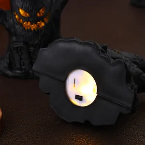 Detaillierte Bodenansicht der Halloween leuchtenden Baumstumpf Dekoration mit Schalter.