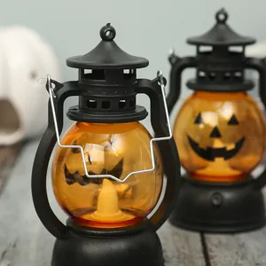Detailed view of LED Halloween pumpkin lantern with glowing jack-o'-lantern face design.