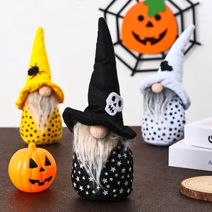 Τρεις αποκριάτικοι νάνοι Halloween σε μαύρο, λευκό και κίτρινο χρώμα.