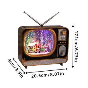Vintage television-shaped Christmas music box snow globe with Santa and colorful lights