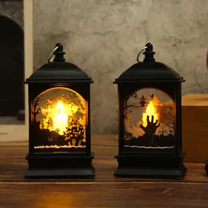 Lanterne LED vintage di Halloween con sagome spettrali e decorazioni a luce calda accogliente.