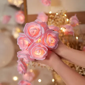 Romantische warme rosa LED-Rosen-Lichterketten für die Innendekoration von Zimmern