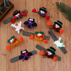 Collection of Halloween LED light-up slap bracelets featuring pumpkin bat and ghost motifs