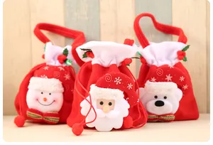 Set of 3 Christmas gift candy bags featuring Santa Claus, Snowman and Polar Bear motifs.
