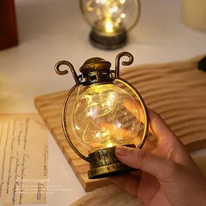 Linterna LED retro decorativa con luces de cadena cálidas para iluminación festiva ambiente
