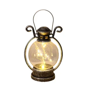 Farol LED vintage con luces cálidas para decoración navideña y luz de ambiente.