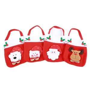 Set of four cartoon Christmas gift bags featuring 3D Santa, Snowman, and Reindeer motifs.