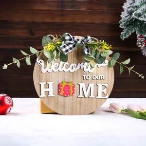 Κοντινό πλάνο ξύλινης πινακίδας Welcome Home με ευκάλυπτο και διακοσμητικό φιόγκο