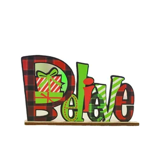 Festive wooden 'Believe' sign with plaid and stripe patterns for Christmas home table decor