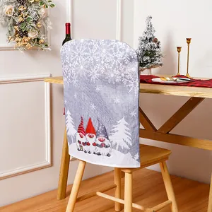 Detailed view of Christmas gnome chair cover with festive forest elders on snowy background