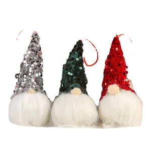 Trois gnomes de Noël à paillettes avec barbes blanches et boucles de suspension
