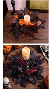 Detalle de corona de Halloween gótica para portavelas con hojas negras y rosas oscuras