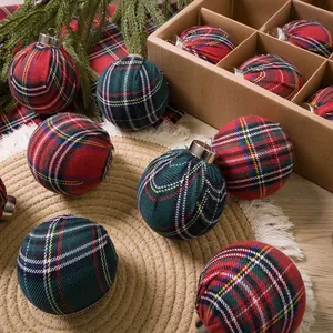 Festive set of red and green plaid Christmas ball ornaments in a kraft storage box