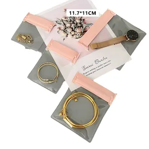 Bolsas portátiles de almacenamiento de joyas con cierre rosa medida 11.7x11cm
