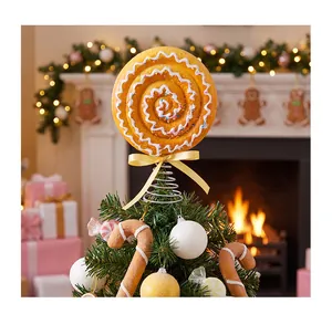 Large spiral lollipop Christmas tree topper with a glitter finish and yellow bow