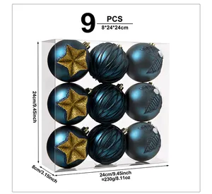 Macro view of 9-piece dark blue Christmas ball ornament set with gold glitter star patterns.