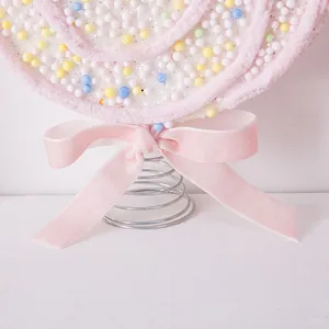 Creative pink foam lollipop Christmas ornament with velvet bow and spring base topper