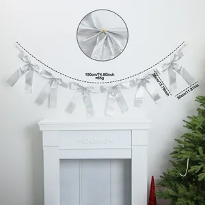 Detail view of 190cm silver Christmas bow garland with size specifications for home decor
