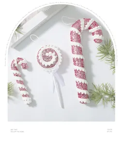 Detail view of pink and white glitter Christmas candy cane and lollipop ornaments set