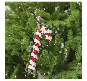 Detail showing dimensions of red and white glitter Christmas candy cane ornament