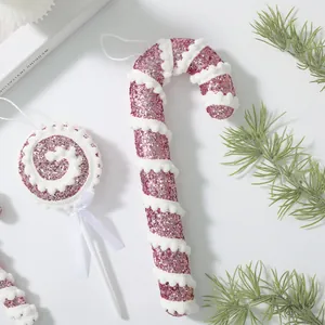 Pink glitter foam Christmas ornaments with lollipop and candy cane shapes for decor