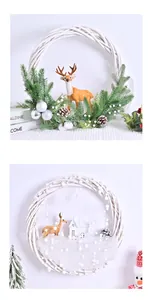 Detalle de dos coronas de Navidad con ciervos realistas y escenas de nieve blanca.