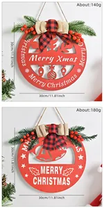 Detail view showing two decorative red wooden Christmas door hangers with plaid bows