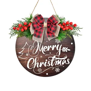 Festive round wooden Christmas door hanger with buffalo plaid bow and red berries decor
