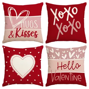 Set of four Valentine's Day pillow covers with red hearts and romantic text